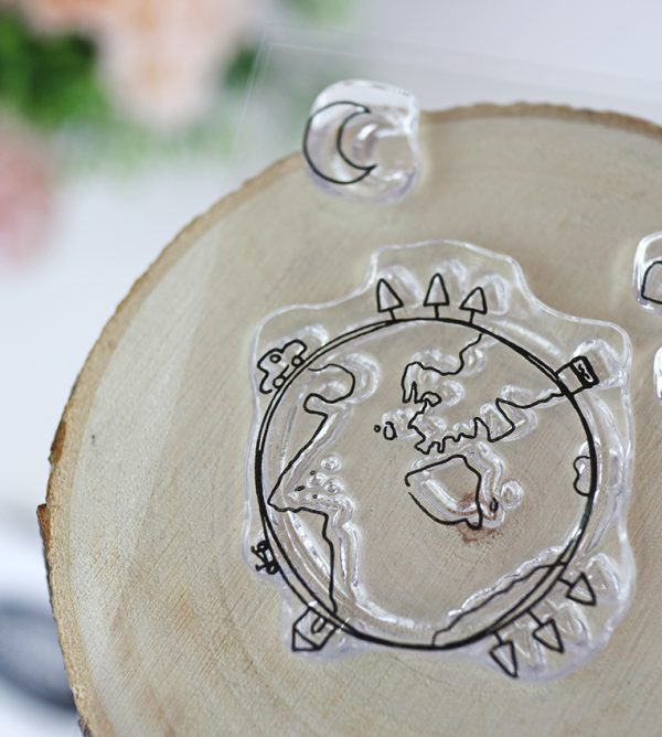Sello de scrapbooking Minimundo de la colección Austral, de Alúa Cid
