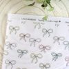 Papel vegetal lazos Living la Vida Cuqui. Para scrapbooking y manualidades. Diseño de Alúa Cid