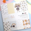 Bloc de 36 papeles para scrapbooking Pelele. Diseño de Alúa Cid