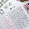 Set de sellos con troquel Feliz Dadivan. Para scrapbooking. Ilustraciones de Alúa Cid