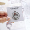 Charm Libertad Navidad, para scrapbooking y manualidades creativas. Diseño de Alúa Cid